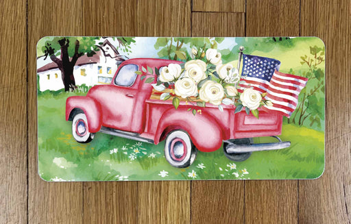 Red Truck with Flag Wreath Sign